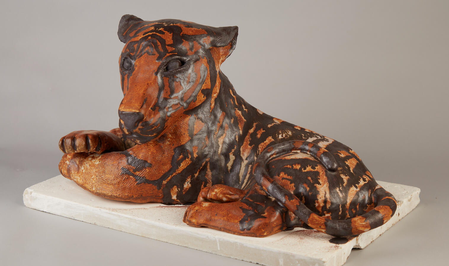 "Self Portrait: Tiger Cub/Tigress," 2021. Rakku clay, coil-built sculpture, 12 x 24 x 14 inches, $800.